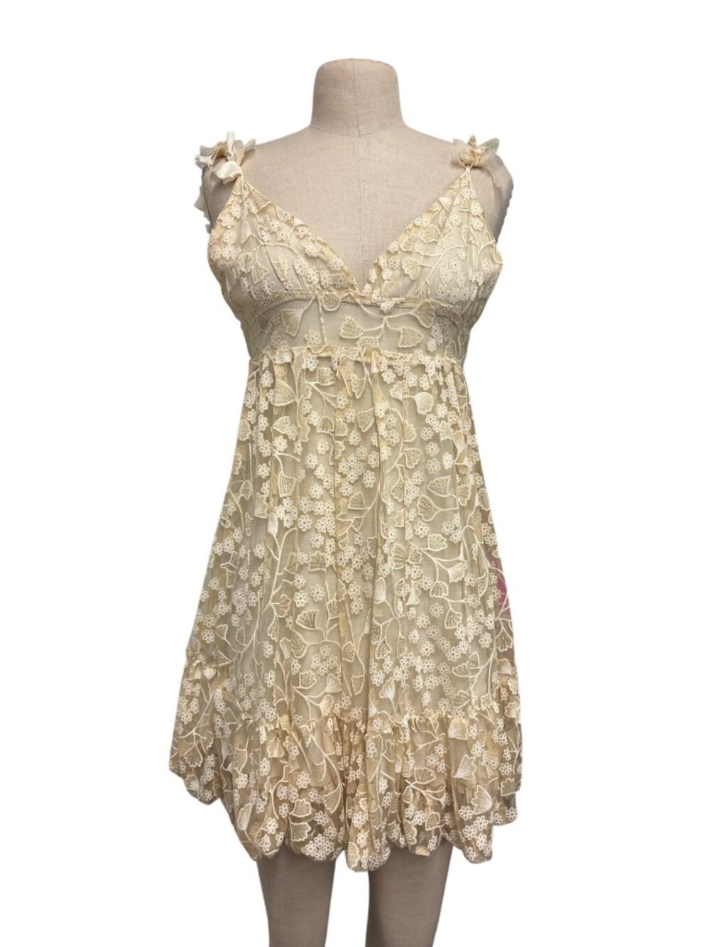La Cofradia Cream Floral Embroidered Mini Dress With Tie Straps & Ruffled Hem